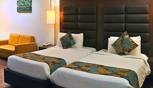 Habitación superior con 1 cama doble o 2 individuales