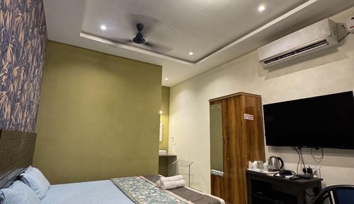 Habitación cuádruple Deluxe, vistas al jardín