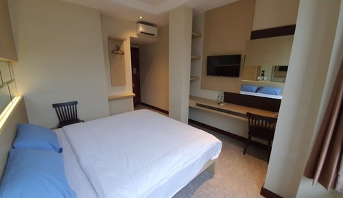 Habitación Deluxe con 1 cama doble o 2 individuales, vistas a la ciudad
