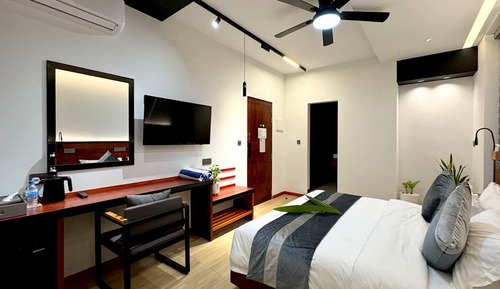 Habitación superior, vistas a la playa