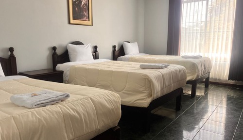 Habitación triple Confort, vistas al parque