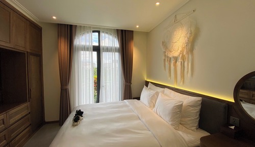 Suite ejecutiva, balcón, vistas al jardín