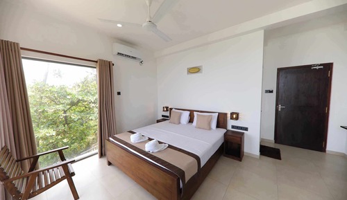 Habitación Deluxe doble, 1 cama de matrimonio grande, balcón, vistas a la playa