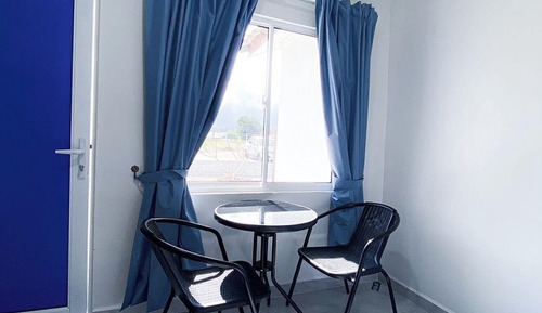 Habitación Deluxe con 2 camas individuales, vistas al jardín