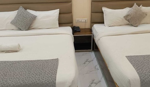Habitación de lujo con 1 cama doble o 2 individuales