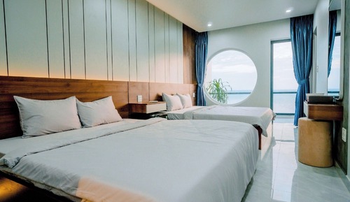 Habitación cuádruple Deluxe, vistas a la playa