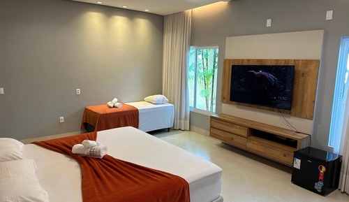 Habitación triple de lujo, vistas al jardín
