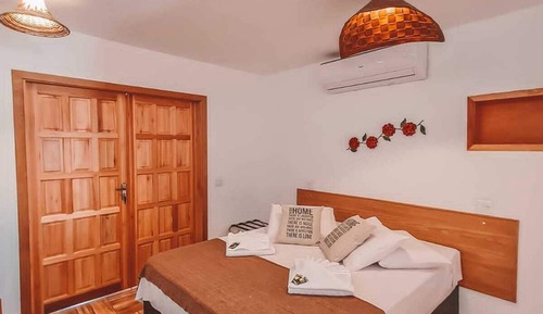 Habitación cuádruple Confort, lanai, vistas al jardín