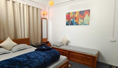 Habitación triple Deluxe