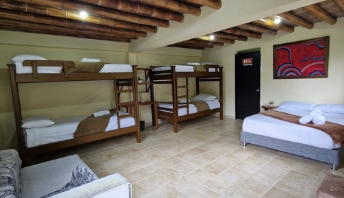 Habitación cuádruple familiar, vistas al jardín