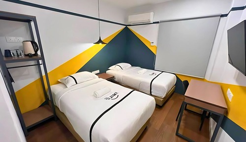 Habitación con 2 camas individuales