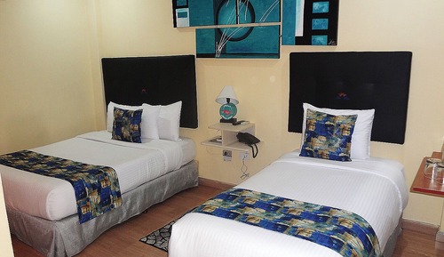 Habitación, varias camas