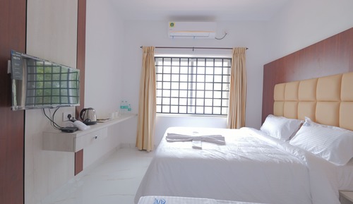 Habitación triple Deluxe