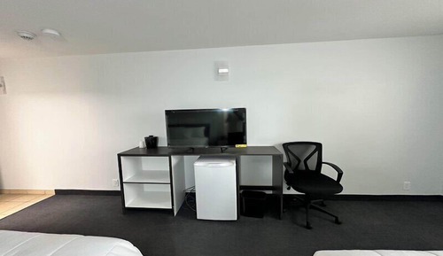 Habitación clásica, 2 camas de matrimonio, vistas al jardín