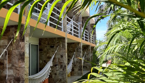 Habitación triple, vistas al jardín