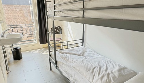 Habitación económica con 2 camas individuales, baño compartido