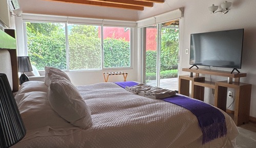 Habitación superior, vistas al jardín