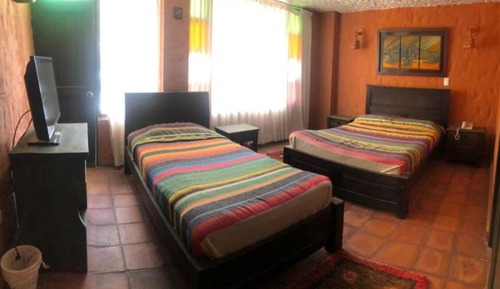 Habitación con 1 cama doble o 2 individuales
