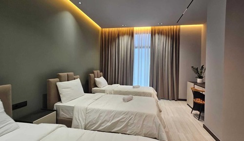 Habitación triple Deluxe, vistas al jardín