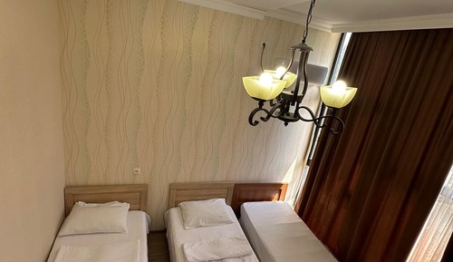 Habitación familiar con 2 camas individuales