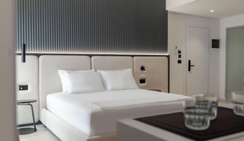 Habitación triple, vistas al mar