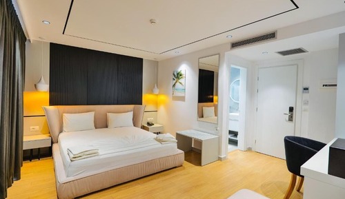 Habitación triple Deluxe, balcón