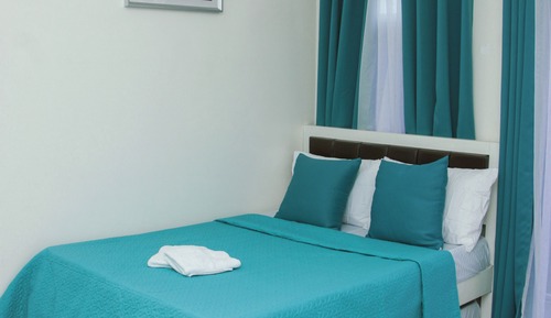 Habitación triple Premier, balcón, vistas al jardín