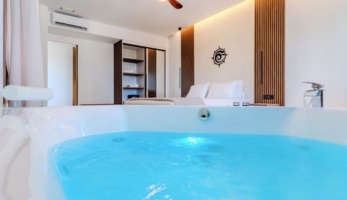 Suite Deluxe, balcón, vistas parciales al mar