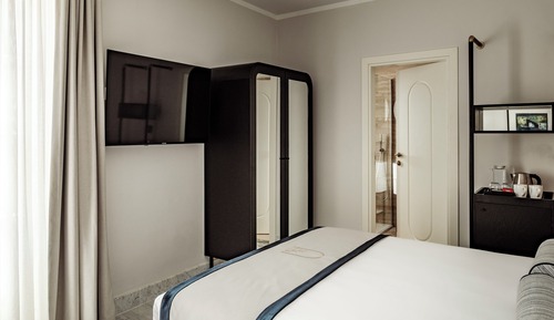 Habitación superior con 1 cama doble o 2 individuales, vistas a la ciudad