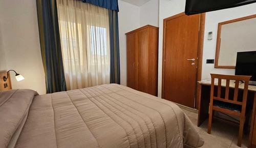 Habitación estándar con 1 cama doble o 2 individuales