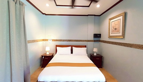 Habitación superior con 1 cama doble o 2 individuales