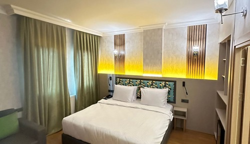 Habitación Deluxe con 1 cama doble o 2 individuales, vistas a la ciudad