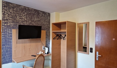 Habitación estándar con 1 cama doble o 2 individuales