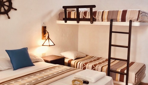 Habitación triple, vistas al jardín