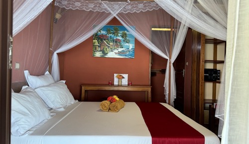 Habitación triple, vistas al mar
