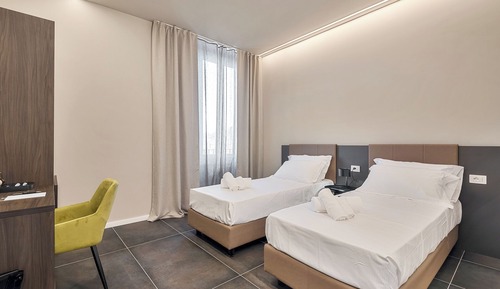 Habitación superior con 1 cama doble o 2 individuales