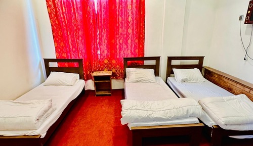 Habitación triple Deluxe
