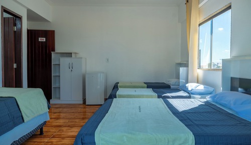 Habitación cuádruple, vistas a la playa