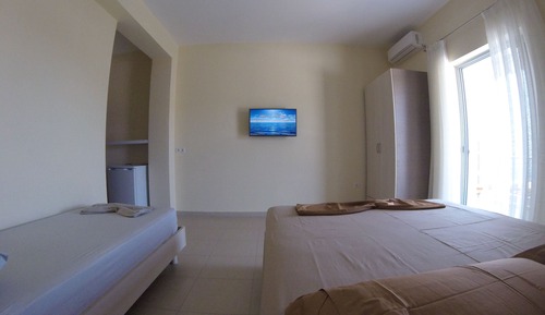 Habitación triple Confort, balcón, vistas al mar