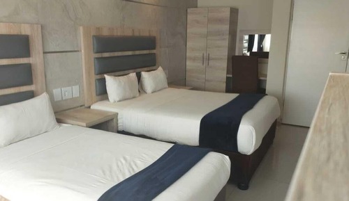 Habitación estándar con 1 cama doble o 2 individuales