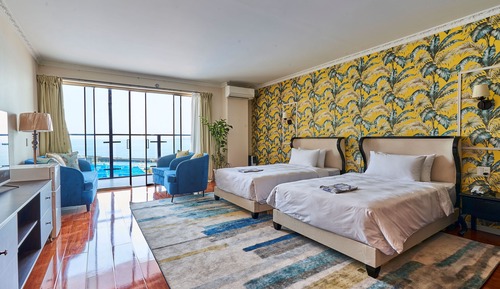 Habitación superior con 2 camas individuales, vistas al mar