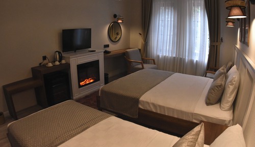 Habitación cuádruple Deluxe, varias camas, vistas al río