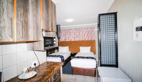 Habitación Confort con 2 camas individuales, vistas al jardín