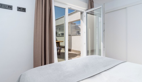 Two-Bedroom Apartment with Rooftop Terrace