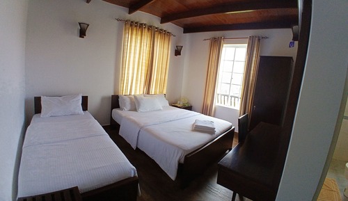 Habitación triple Deluxe