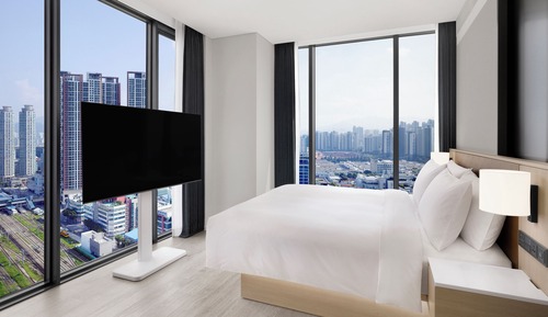 Habitación Deluxe, 1 cama de matrimonio grande con sofá cama, no fumadores, vistas a la ciudad
