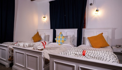 Habitación cuádruple Deluxe