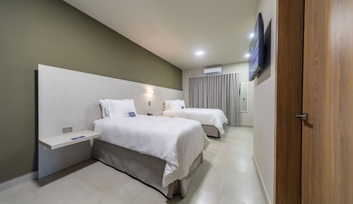Suite Signature, baño privado, vistas al jardín (Suite Junior 1.06)