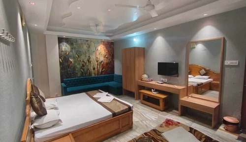 Habitación triple Deluxe, varias camas