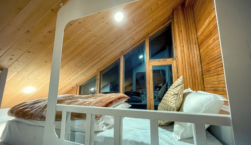 Dormitorio compartido Signature